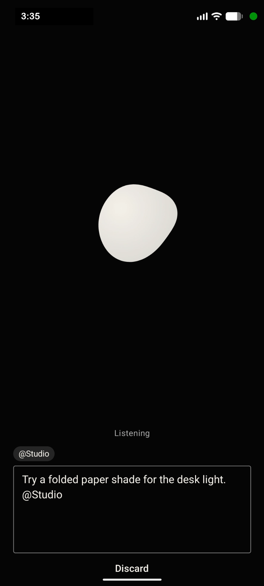 Capture listening with the thought: Try a folded paper shade for the desk light. @Studio