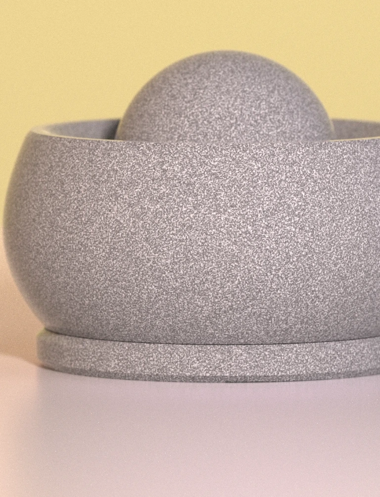 Close detail of the Half Lotus mortar and spherical pestle